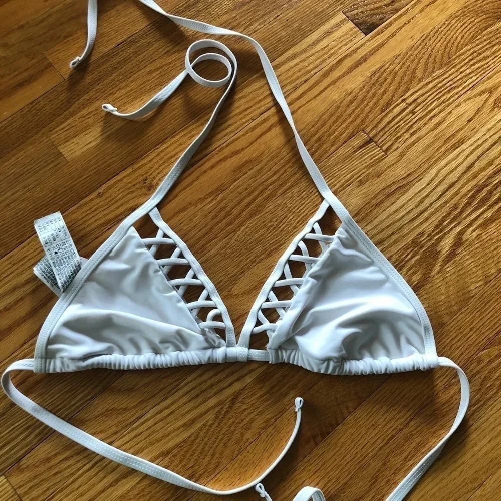 3 white bikini tops
